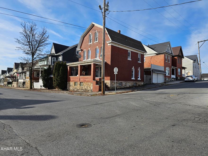 Two story brick home with 4 spacious bedrooms and 2 bath rooms. Enclosed back porch and 2nd floor balcony. TLC is all this home needs. Great investment opportunity.