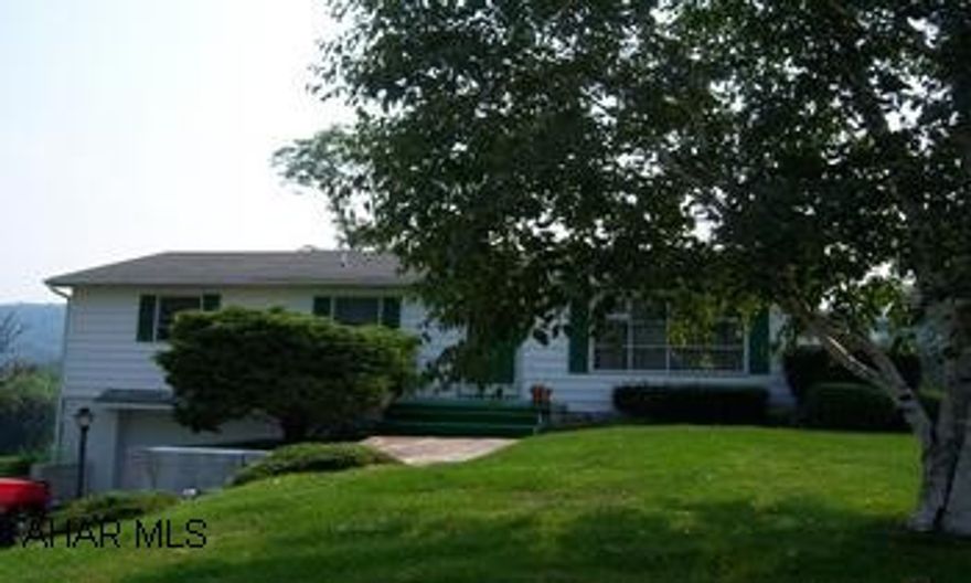 3 bedroom ranch home with one car integral garage, above ground pool on approx 1/2 acre.