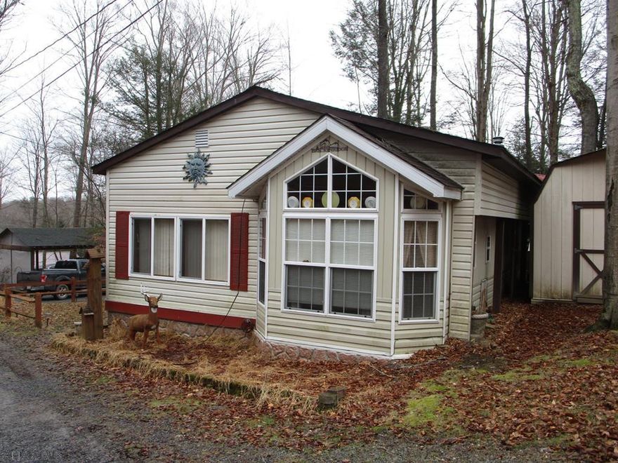 Generous addition to the Breckenridge park model offers spacious living for full time residency or week end getaway.  Covered porch extends your enjoyment to the outdoors.  Shed gives you added storage.  Set up for year round living.  Located in Glendale Yearound, a gated recreational development.   Owner has had health issues and is preparing to move.  Inside pictures to follow when she gets home in order.  House can be shown with 24 hour notice.