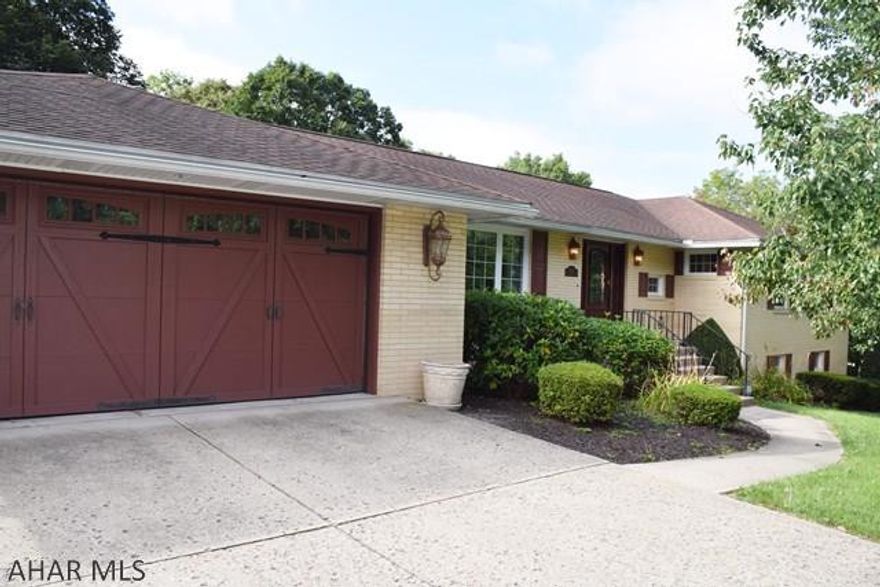 Beautiful brick ranch on large lot.  3 Season sun room.  Central Air.  Updated kitchen with newer stainless steel appliances.  Updated baths.  Laundry on main floor.  Finished basement with half bath.