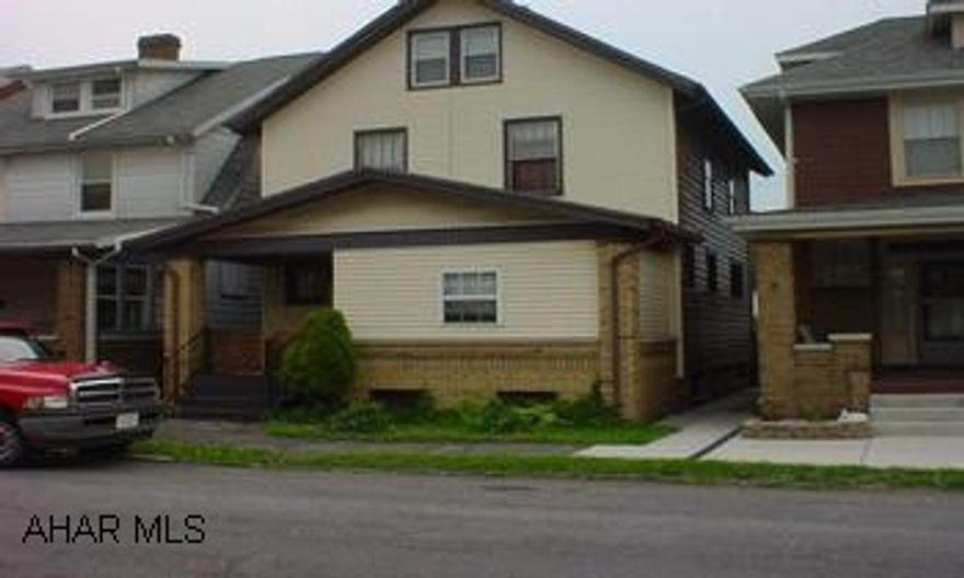 3 bedrooms, 1.5 baths, fireplace, hardwood floors, finished attic.