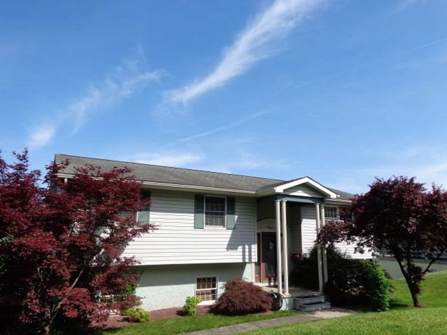 Outstanding outside and inside. A splendid updated eat in kitchen with granite countertops. All stainless steel appliances included. Brick fireplace in finished basement. Swimming pool with a great deck area and all patio funiture included. Heated 2 car garage, shed, central vac system.