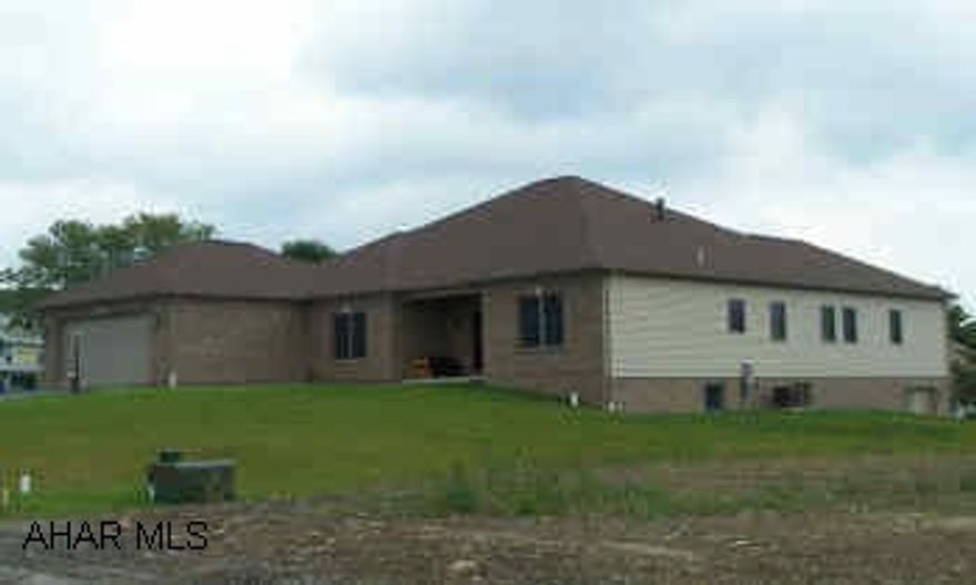 Gorgeous, extremely well built custom 1 Story-Less than 6 months old-2600 sq. ft. Plus an unfinished basement that could be finshed as well- Wow!! Don't just drive by! Beautiful Sprawling ranch Home with tile floors, Granite counter tops, 2 sided fireplace and more. Great family home in a nice country Setting!!