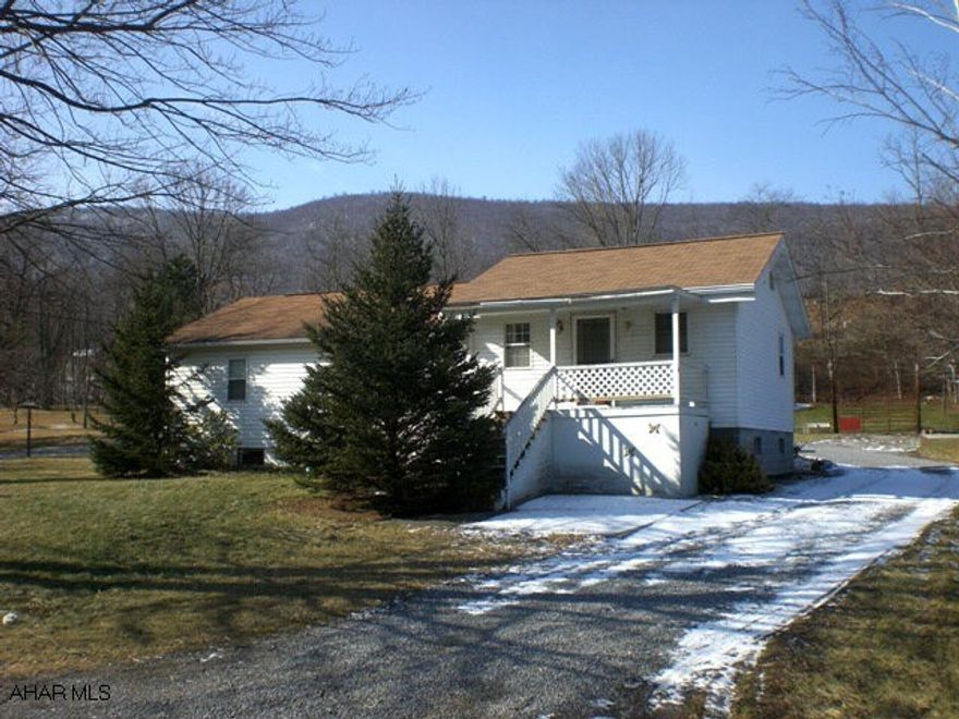 One story home w/ newer thermo pane windows. It offers a LR, kitchen w/ hickory cabinets & cathedral ceilings, 3 BR, 1 BA & first floor laundry room. Oil forced air heat, 200 amp electric with full basement & public sewer. Large 2 car garage with workshop area.