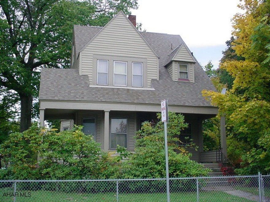 Exterior of the home has been finished with vinyl siding, shingle roof.  Interior needs decorated.  Older kitchen and bath.  Original woodwork and hardwood floors.  Loads of character.  Nice level fenced lot.  Two-car detached garage.  Priced to sell!