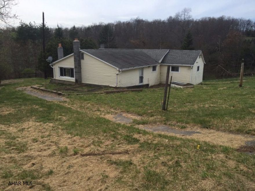 3 bed ranch style home on 9.53 acres in Chestnut Ridge School District.  House has newer roof.  Needs some TLC.  Priced to sell.