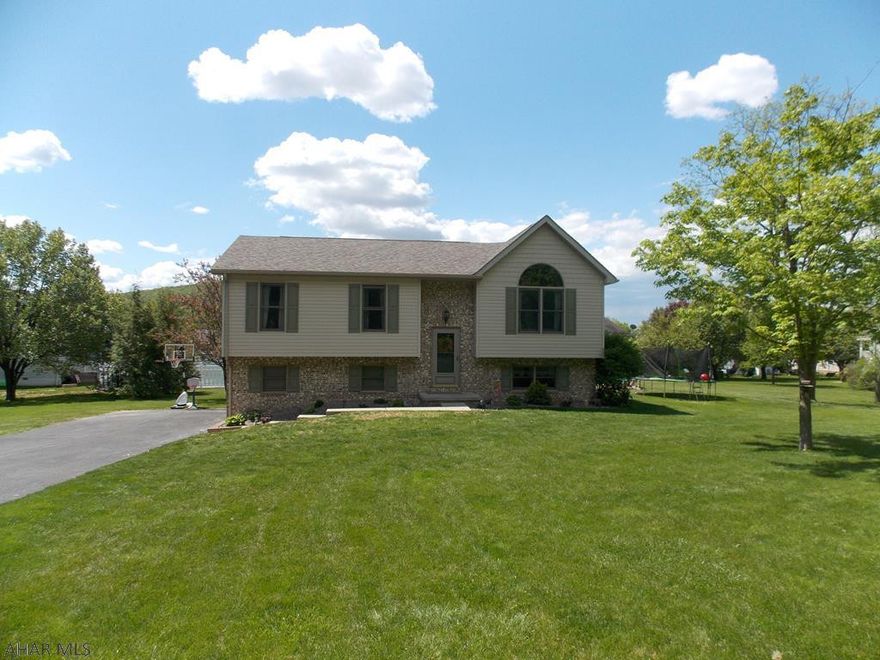 Gorgeous Home in Hollidaysburg School District! Beautiful kitchen that features newer slate appliances, plenty of cabinet space, and a pantry. Spacious living room with luxury vinyl plank flooring. You will love the arch window in the living room that gives tons of natural light! Enjoy summer evenings in the sunroom! Family room in the lower level is great for family gatherings. New roof in 2019.  2 car Integral garage and attached shed. Great curb appeal and kids will love the yard. Extremely well-maintained and ready for a new owner! This home has so much to offer!