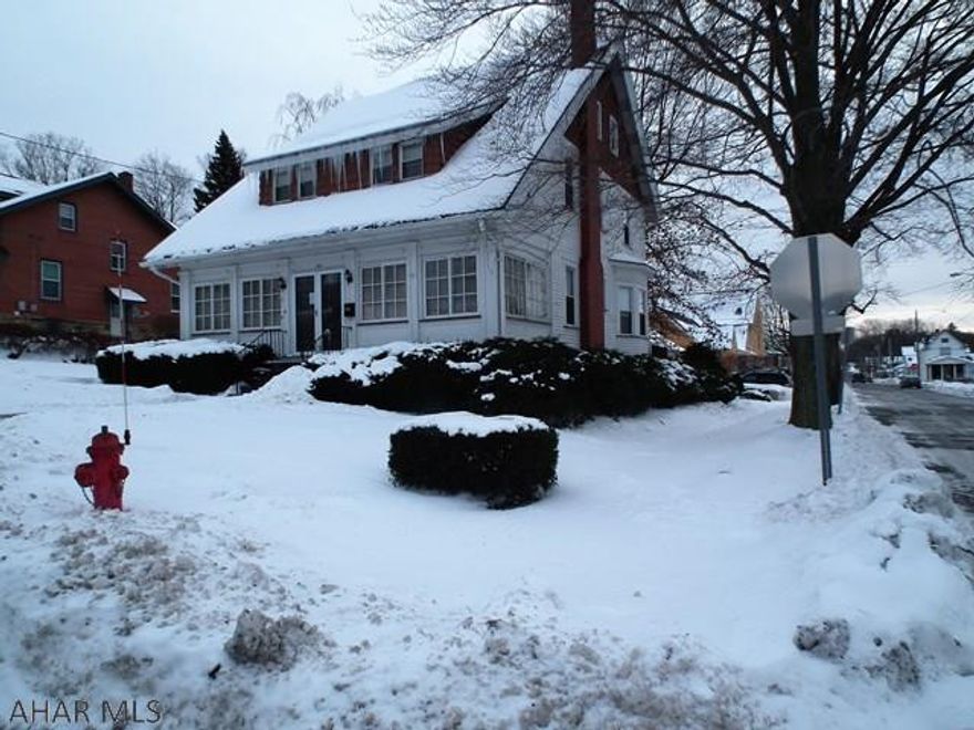 Family Valentine-Forget The Chocolates I'm Yours! Don't miss out on this corner lot home that invites family and friend's enjoyment. Home has 4-5 bedrooms, loads of closet space with additional finished area in attic for 5th bedroom and office or play area. Updated bathroom 2nd floor with 1/2 bath on 1st floor. Spacious kitchen with eating area and a nook area for reading or just enjoying scenery. Large living room with fireplace extends family and friend entertaining. Welcoming foyer area leads to enclosed porch for the spring thru fall enjoyment. Newer detached garage. Close to playground, schools and church! Don't miss out, call today for your showing.