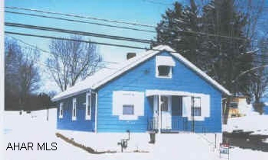 Bungalow on .8 acre with large 2 car garage. Almost an acre in Allegheny Township.  Home needs some updating.  Dry, clean basement.