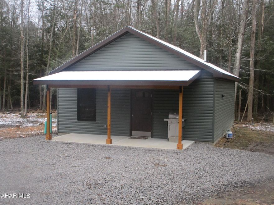 Brand new construction in 2023.  Cozy and efficient two bedroom, one bath cabin with all the comforts of home.  Perfect for a weekend getaway or the downsizing couple. Granite countertops in the well appointed kitchen.  Fully furnished.  Heated floors.  Full laundry.  Ready for you to move in and enjoy life in the woods.  
Glendale Yearound amenities include a club house, swimming pool, tennis / basketball / tennis courts, dog park, pavilions, playgrounds, planned activities.  Adjacent to Prince Gallitzin State Park / Glendale Lake and close to thousands of acres of state game lands and Rock Run ATV Park.
If you love the outdoors you need to check out this cabin.