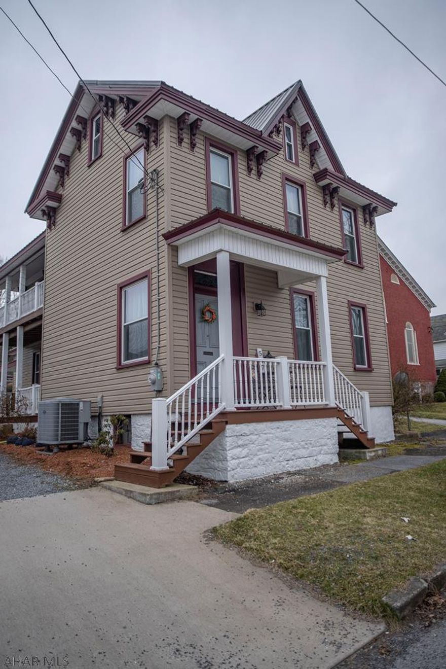 Newly remodeled 2 story home with a detached 2 car heated garage  in the Williamsburg boro. This home features a large eat in kitchen and dining room. A beautiful stone fireplace with pellet stove insert makes the living room the place to be. Upstairs are 3 large bedrooms and a full bath with an over sized hall way that leads out to nice balcony .  First floor laundry and lots of storage  space.  Schedule your tour today.