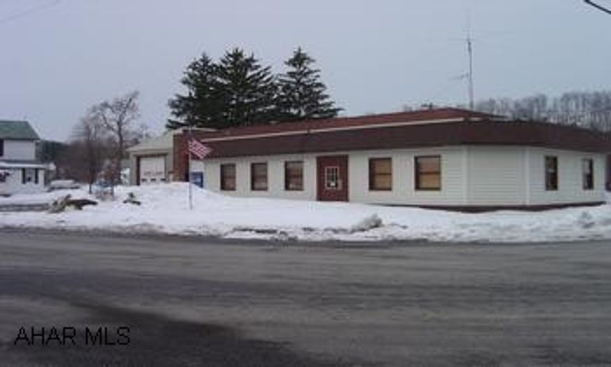 6,200 sq', brick building, office and warehouse/garage. Corner lot.