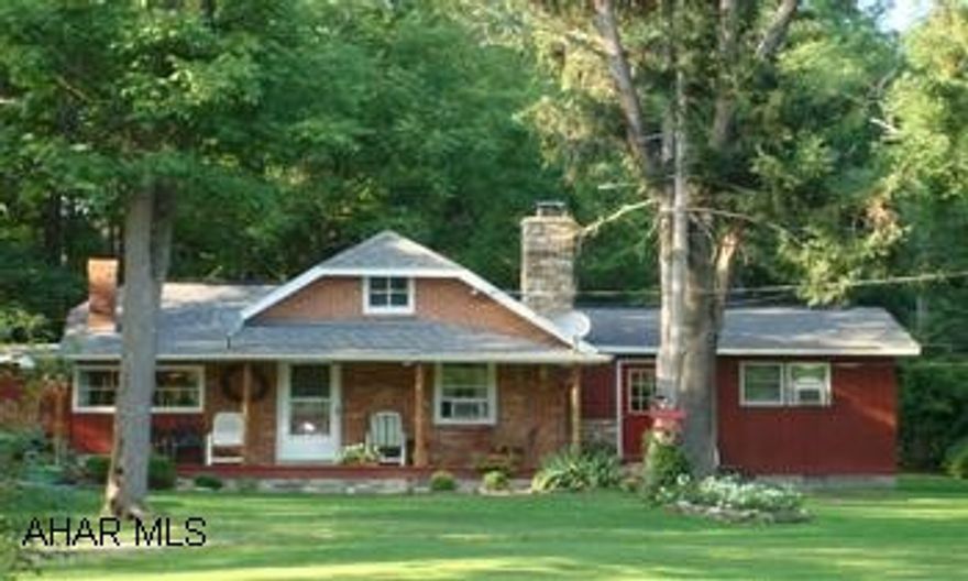 1.56 Acres in Scotch Valley.  Trout stream on corner of property. Close to State Game Lands.  Nice level  lot.  Concrete pond.  Two sheds, one with attached carport. Relax on the 1.56 level acred lot in the country. Trout stream on corner of property.  Close to State Game Lands.  Concrete pond on property.  Fireplace in living room.  Two outbuildings - one with attached carport.