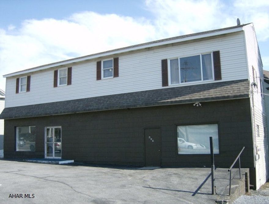 2 commercial spaces on the 1st floor. One with 2 offices/bath & One with one office/bath. Second floor is a 3 BR home. Parking in front.Great investment potential! Priced to sell
