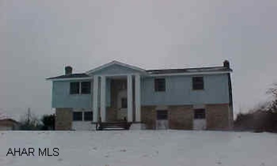 Newer roof, siding, windows, basement partially finished