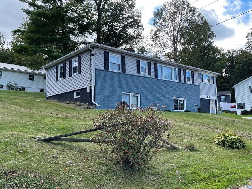 This beautifully updated raised ranch is a must see! Perfectly located just outside of town in old Lakewood just minutes from town. Hardwood floors throughout the upstairs. Lots of space in the partially finished, walkout basement. Both bathrooms have been recently updated. Don't miss out on this beautiful property.