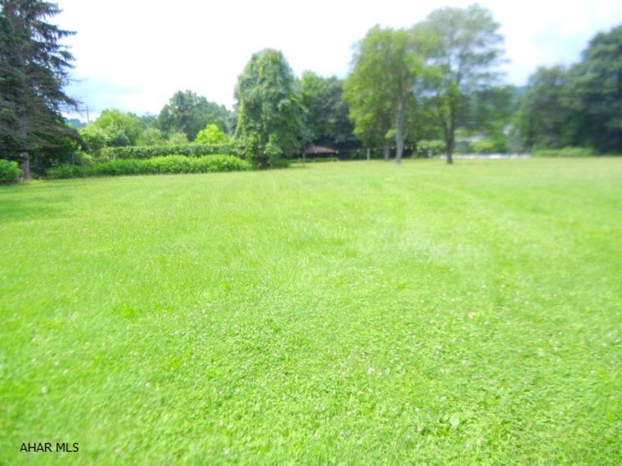 Pavilion with electricity, shed/garage.Zoned R1A, sold as single parcel but could be subdivided by buyer for development.