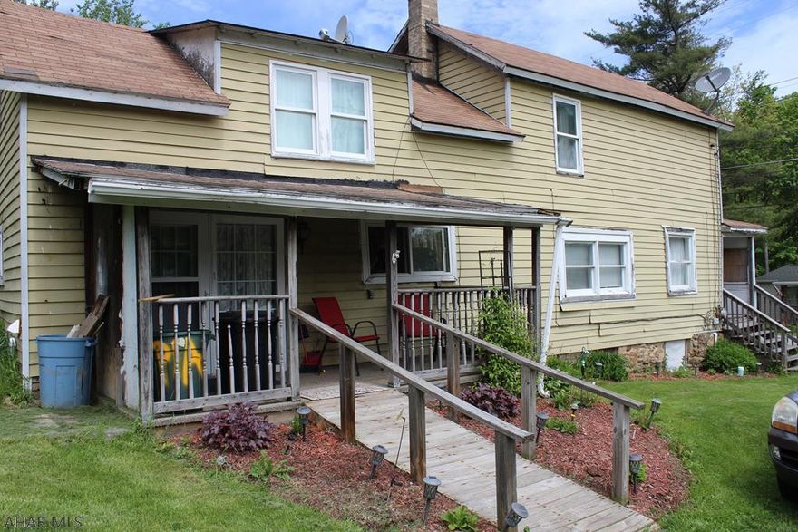 This could be an investors dream or a fabulous first time home buyers DIY project.  Small flat fenced in yard with newly renovated first floor. Large bathroom, first floor laundry, dining rm/family rm combo.  Two bedrooms with space to create a den or play area.  Great neighborhood.  Close to Historic Dowtown Bedford, Raystown Lake, Shawnee Lake, Johnstown & Altoona Airport.  This home needs some TLC, but the potential is outstanding.  It's a must see.   *All measurements are approx & up to the buyer to confirm.