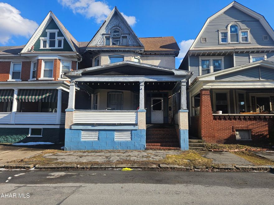 Handyman special! Many of the big projects have already been completed. The roof, furnace, and hot water tank are all less than 5 years old. This home featerures a large living room and dining room. 3 large bedrooms with a possible 4th bedroom in the attic. The laundry room is located on the second floor.