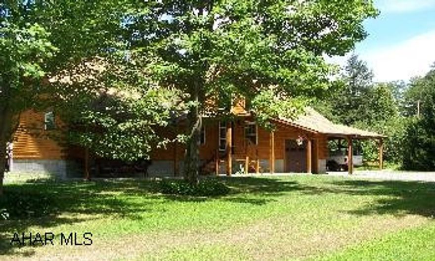 Go up Foot Often Road-Pass Church-make left on Willon Bridge lane-follow rd-1st home on right.Go up Foot Often Road-Pass Church-make left on Willon Bridge lane-follow rd-1st home on right. Beautiful Log Contemporary on 3/4 acre in Hollidaysburg.  Pecan kitchen, hickory floors, fireplace, pool, central vacuum and so much more.
