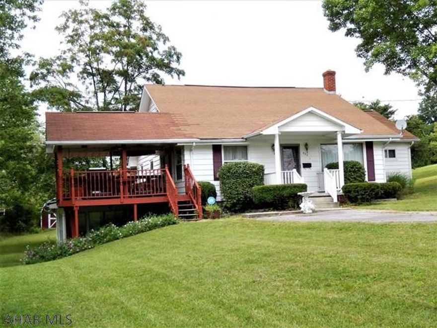 What a find! This home sits on a beautiful (.44) almost 1/2 acre lot. But .... The purchaser will get the 8 lots surrounding it (one acre). The total acreage  is 1.44 acre. It has  a 24 X40 garage that holds 4 cars. This home includes 3 bedrooms, the attic makes 4th bedroom (With 3/4 bath, works but needs TLC). There is a full bath on the main floor with 2 bedrooms,Plus an On Suite Master Bedroom (bedroom, office, walk-in closet, Bathroom).The Family room is in the basement with a full kitchen and sunroom is off the kitchen. Perfect for entertaining!!!!. There is also a gorgeous covered deck off the Main Kitchen. This property has been well maintained. Hardwood floors through out. It  has a newer 3 zone furnace, electric service and Hot water heater. Mostly replacement windows.