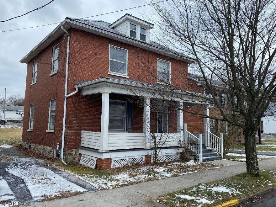 Two story brick home is conveniently located in downtown Bedford close to all amenities.Eat in Kitchen, Welcoming large foyer,  Enjoy relaxing on the large front porch.  level backyard. Walk up attic has potential to be finished for additional living space.