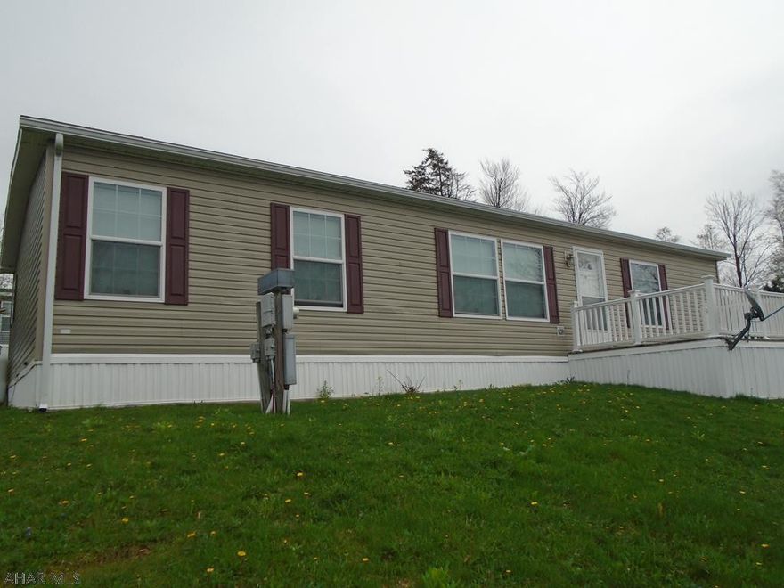 2016 Champion Doublewide in Laurel Woods Mobile Home Park.This can be moved to your own ground!!!! This vinyl sided 3 bedroom 2 bath home has an open floor plan. Living room, dining room, and kitchen. Laundry room with separate entry. Beautiful kitchen with dark cabinets and marble design laminate counter tops. Master bedroom with walk in closest. Master bath with garden tub and large shower. Double sinks. 2 bedrooms with large closets. This home is a must see!!