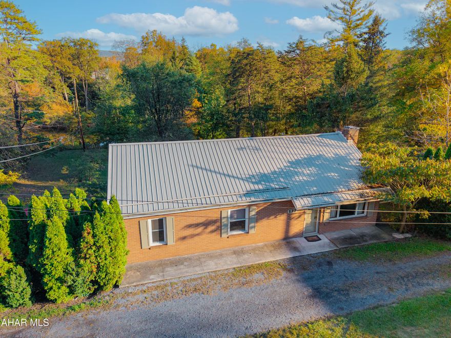 Experience the charm of waterfront living in this beautifully built 3-bedroom, 1.5-bath brick home on .75 acres along the river. Enjoy a lifestyle that combines tranquility and recreation with space to kayak, fish, or simply relax by the water's edge. 

The brick exterior showcases quality craftsmanship, and the spacious lot provides room for outdoor entertaining or gardening. With easy access to Route 30, Everett, and Bedford, this property offers a rare combination of comfort, elegance, and natural beauty.