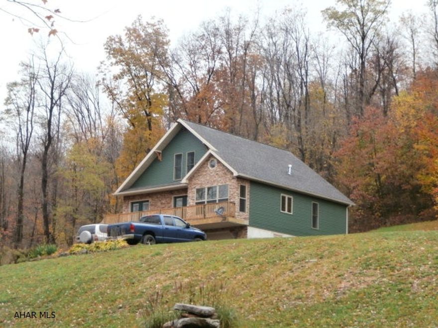 1.5 story quality constructed home. Custom Patrick kitchen, Pella windows, oak trim, vaulted ceiling, radiant heat - only uses approx. 500 gal of oil/yr - too much to list - all on 14 wooded acres with boro water and sewer!