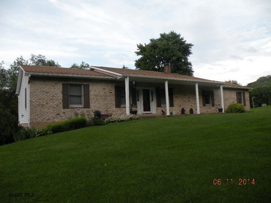 Beautiful ranch, 3 BR's, 2 full baths. Located just outside of Northern Cambria. 1.4 acres. Sit on your deck & enjoy the beauty of the flower gardens. Bamboo floors, AC, wood/coal/electric heat