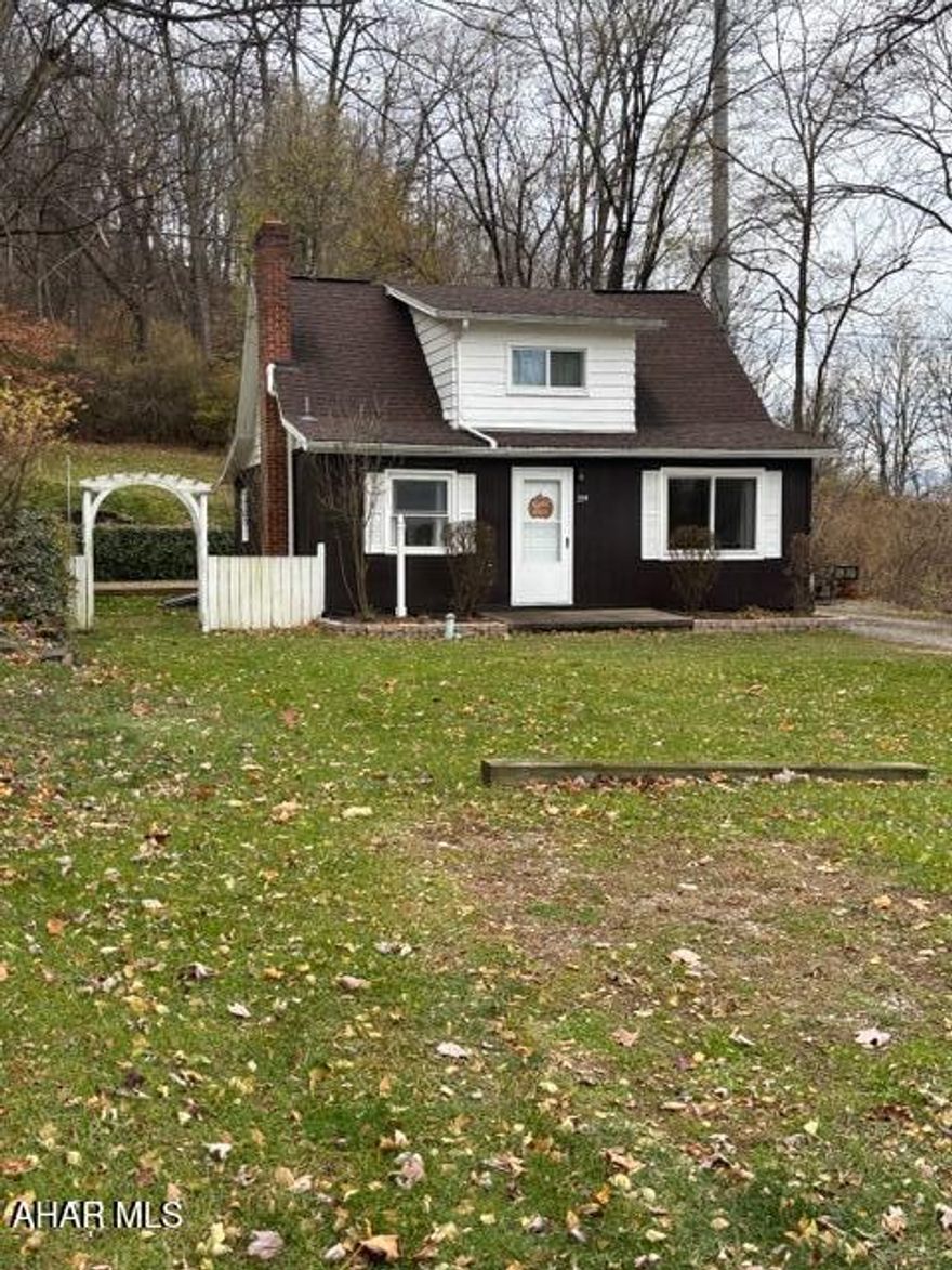 If you are looking for privacy, then you found it! Situated on over 2 acres, this 3 bedroom 1 bath Cape Cod has so much to offer. The 1st floor has an over-sized kitchen with dining area, living room, full bath and bedroom. On the 2nd floor, you will find 2 bedrooms and a large closet. The basement includes a family room and laundry area. Outdoor entertainment has endless possibilities with the flat yard and fire pit. The property borders Hollidaysburg Borough property, which is great for hiking! Don't forget the garage, large enough for a workshop and walk up storage with a door that leads to the yard. Call today to schedule your tour.