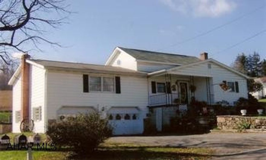 1 1/2 Story home with nice yard, inviting front porch, 2-car garage, above ground poo, and workshop. Central air, public water / sewer, lanudry in basement has shower and sink.
