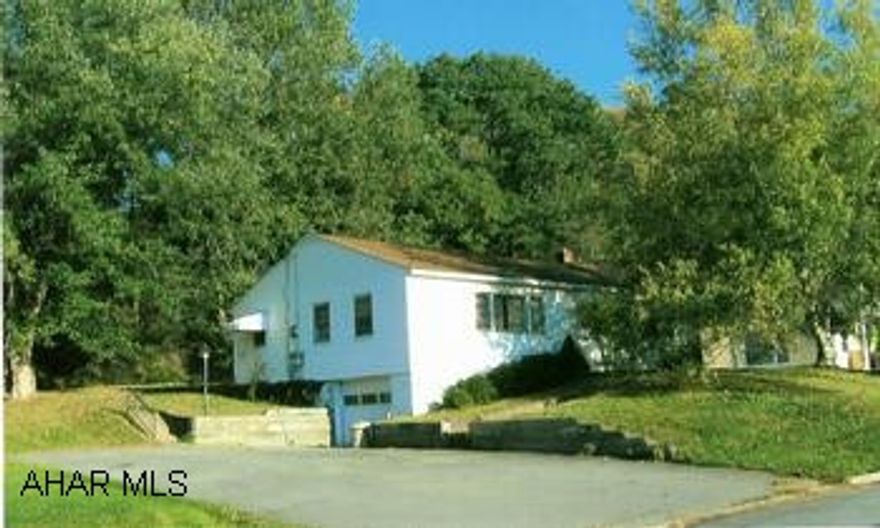 Quiet pleasant neighborhood for this ranch home that needs some loving attention. Great potential, hardwood floors, rear covered patio, paved drive.