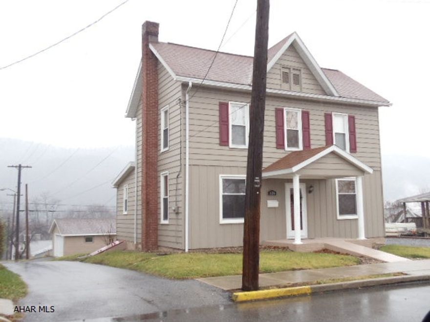 Nice home with modern kitchen and bath, near ballfield and YMCA. Aluminum siding, 2-car garage, breakers    #J-113