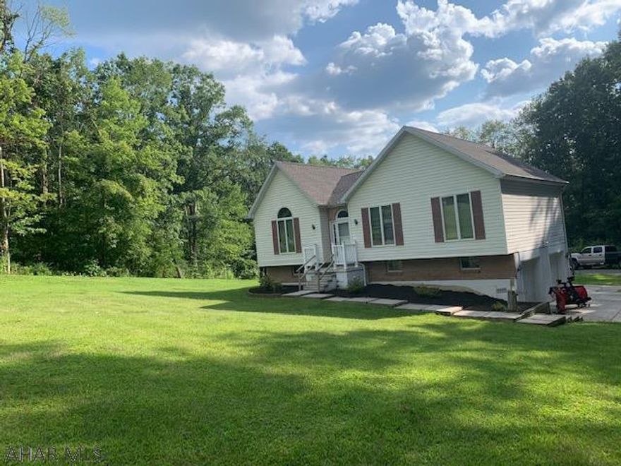 Great location in Northern Bedford School District. This home is located at a dead end street and has lots of privacy with almost an acre of land. Also included is a 36x44 detached garage great for a working garage or personal garage. Must see Call today for a tour