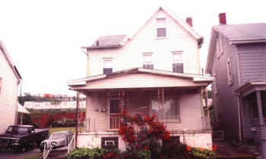 Great starter home offering 3 Br, 4th Br. possible in attic.  1 BA up, 1/4 Bath main floor, 1 car garage & fenced in yard.  Priced right at #30,000.  Request Crystal. Appraisal  on file. DR & LR chandeliers will be replaced with light fixtures.