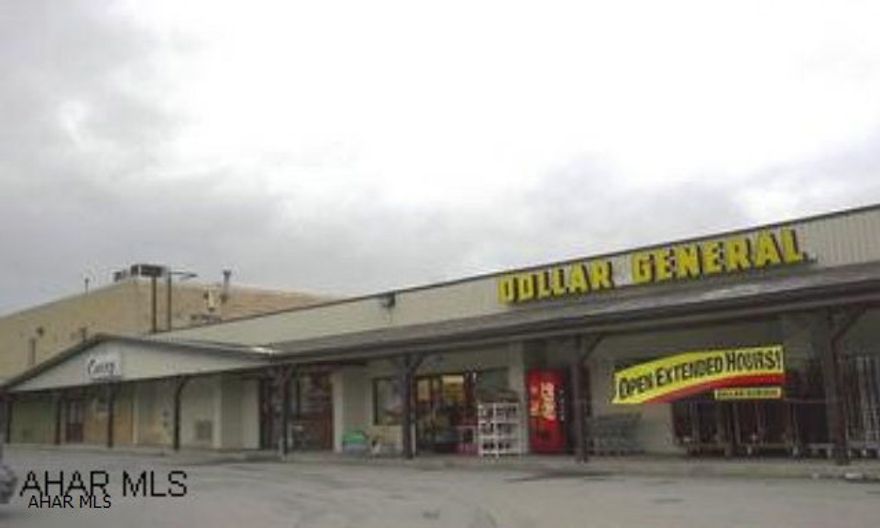 Great opportunity for your current or new business with income ($3750/mo to increase July, 2015 to $4000/mo)from triple net lease with DOLLAR GENERAL to pay the mortgage. 6578 sq ft set up for restaurant with 2 bars, large kitchen and hardwood dance floor that can be sectioned off for banquets, or you can convert for doctor office or medical facility, offices or retail.  2nd floor has 5355 sq ft with party room, concrete and steel storage or game rooms and possible apartment to live in or lease out. Many possibilities for commercial or health care facility. Close to I-99 Tyrone/Grazierville exit. 20 min to Altoona and State College!
