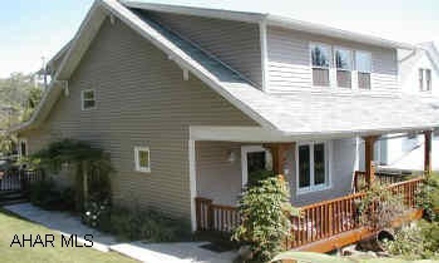 OAK HARDWOOD UNDER CARPET. CHARMING 2 STORY WITH LARGE LANDSCAPED YARD. LOVELY SIDE & REAR DECK, PLUS COVERED FRONT PORCH, GARAGE & 2 OFFSTREET PARKING SPACES. ORIGINAL WOODWORK, UPDATED KITCHEN & BATH, CENTRAL AIR, NEW FURNACE & CARPET.