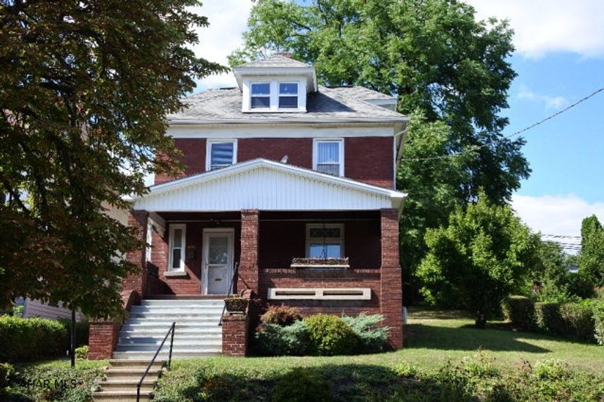 Classic Boro Brick Home.  Enjoy summer days on the front porch swing and evenings on the screened rear porch.  Appliances stay.  Bonus room on 2nd floor could be a bedroom or a master bath? 2 Car garage, off street parking, plus a patio.