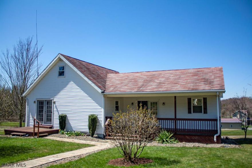 A fantastic find in a beautiful country setting! This lovely cape cod style house sits on an acre of land. It has 3 bedrooms and 1 1/2 baths and an addition that includes a family room  with tile flooring & french doors leading out to the front deck. The kitchen offers a large pantry and ample cabinet space. There is also a dining/living area with wood-style vinyl flooring and front porch access through french doors. A bonus room and a full bath are also on the main floor. Upstairs, you find an additional two bedrooms. The property has an attached two car garage and a separate, detached two car garage for vehicles, storage or even your own workshop!  Out back there are hook ups for a hot tub on the patio. See this home with a virtual walk through 3D tour on the broker website!