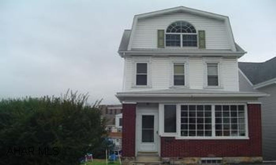 Former multi family partially renovated to single family. Worth a look, call Lori for more details 330-2286. "Sold As Is Where Is"