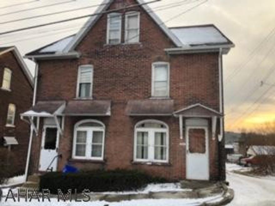 Side by side units currently deeded separately but being sold as 1 property.  Needs lots of work.  AS IS - Seller will not make any repairs.  Electric is on.