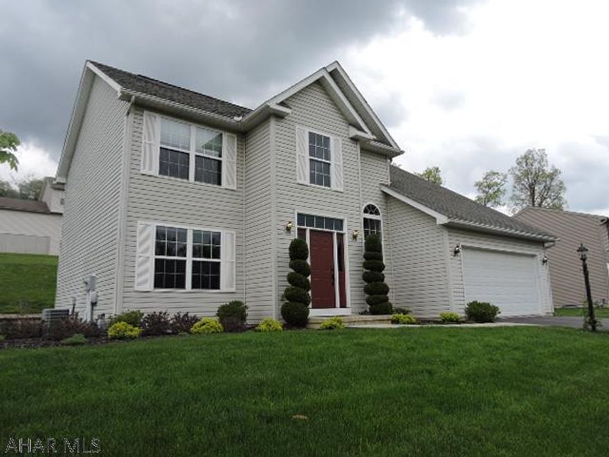 Move right into this spacious home.  Nicely appointed hardwood floors & open floor plan.  Screened in porch off kitchen..Cherry kitchen with center island & stainless steel appliances.  Recently renovated basement has engineered bamboo flooring and entertainment area and den