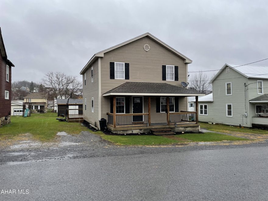 Basically the entire house was torn down except one wall and starting in 2000 a new block foundation , exterior framing, vinyl siding,studs, interior walls, floors, floor covering wiring, plumbing, insulation,roof, windows, addition, kitchen and baths were installed.(taxed as new construction in 2000) Spacious home offers walk-in closet, vaulted pine tongue & groove ceilings