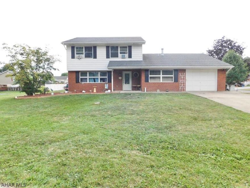 Fantastic 2 story brick and vinyl home in Duncansville Borough!  This 3 bedroom 3.5 bathroom home has ample space.  The kitchen features beautiful, Corian countertops and breakfast island overlooking the family room.  The first floor offers 2 bathrooms, living room, office, laundry and much more.  The spacious bedrooms upstairs will not disappoint.  With two additional bathrooms on the second floor, you are set!  Situated on a quiet, corner lot, this home is a must see!  Seller is offering a buyer 1 year home warranty with acceptable offer.