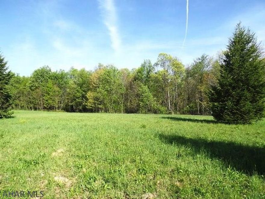 Build your own retreat on this nicely wooded and flat lot. Perfect location and short drive to Johnstown and Bedford. close to all amenities. In an area of fine homes.