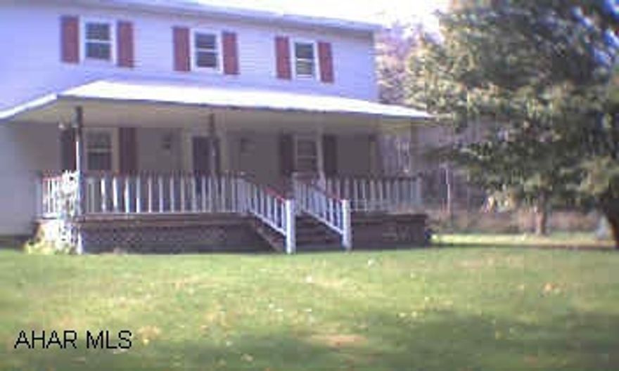 2 story frame, three car garage on 2+/- acres private, nice setting, no basement