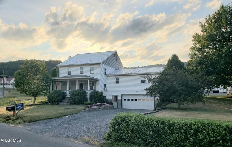 Great country setting! 5-bedroom, 3-bath vinyl-sided home with addition, 1st-floor laundry, 2-car attached garage, 30x48' detached heated shop and 14x16' shed on 1.45 Acres. There are 2 wells (one for the shop and one for the home). Lane to left belongs to neighbor. J-653