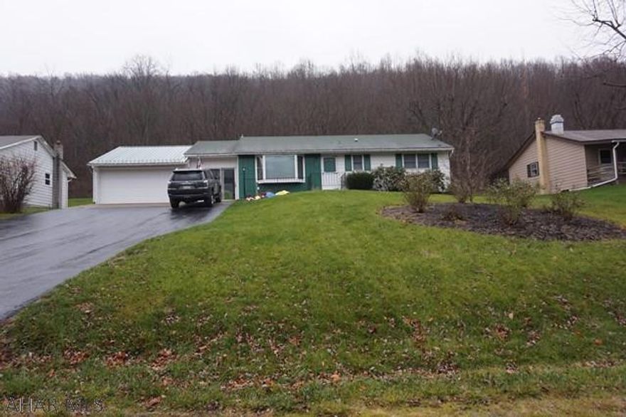 Ranch home just outside of Mount Union. 2 car garage with breezeway. Fenced yard.  Address is 14215 Christoff Ave, Mount Union, Pa 17066.
