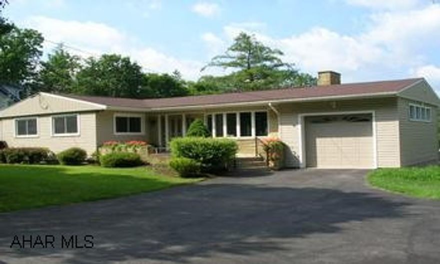 REFURBISHED 3 BEDROOM, 2 BATH RANCHER ON A BEAUTIFUL LOT.  HARDWOOD FLOORS, NEW BATH, CORRIAN COUNTER TOPS, STAINLESS STEEL APPLIANCES, SCREENED PORCH WITH CARPET, INVISIBLE FENCE FOR DOG.  FINISHED LOWER LEVEL, HOME WARRANTY INCLUDED.